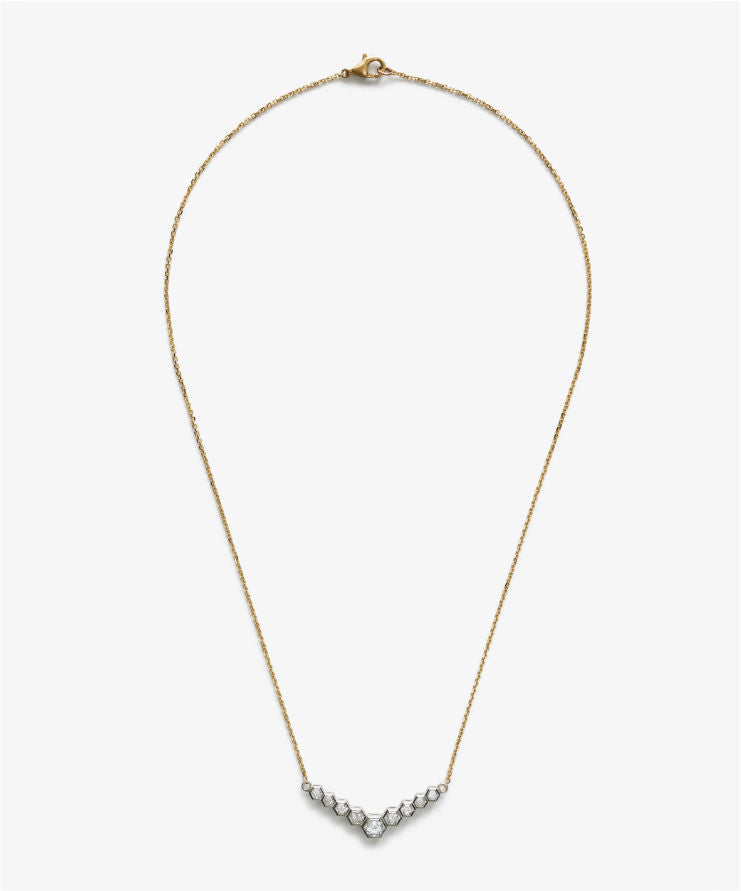 Necklace with small beads on a white background.