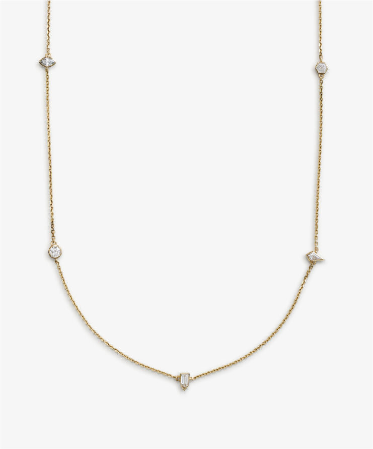 Elegant long gold chain necklace featuring bezel-set diamonds in various cuts, including round, square, and triangular shapes, displayed on a white background.