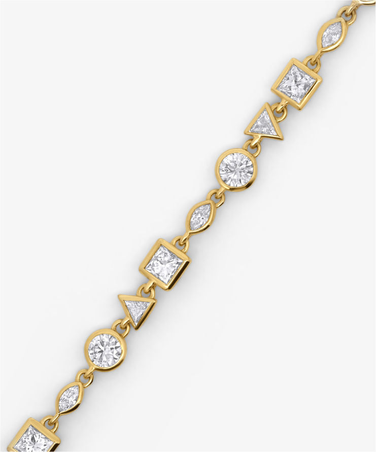 Gold chain bracelet on a white background.