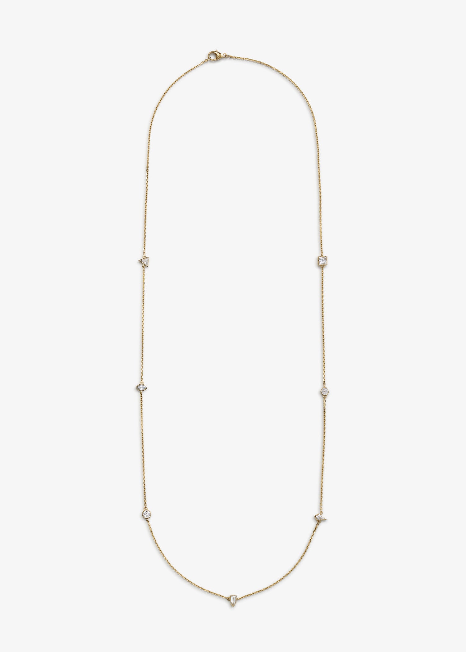 Elegant long gold chain necklace featuring bezel-set diamonds in various cuts, including round, square, and triangular shapes, displayed on a white background.