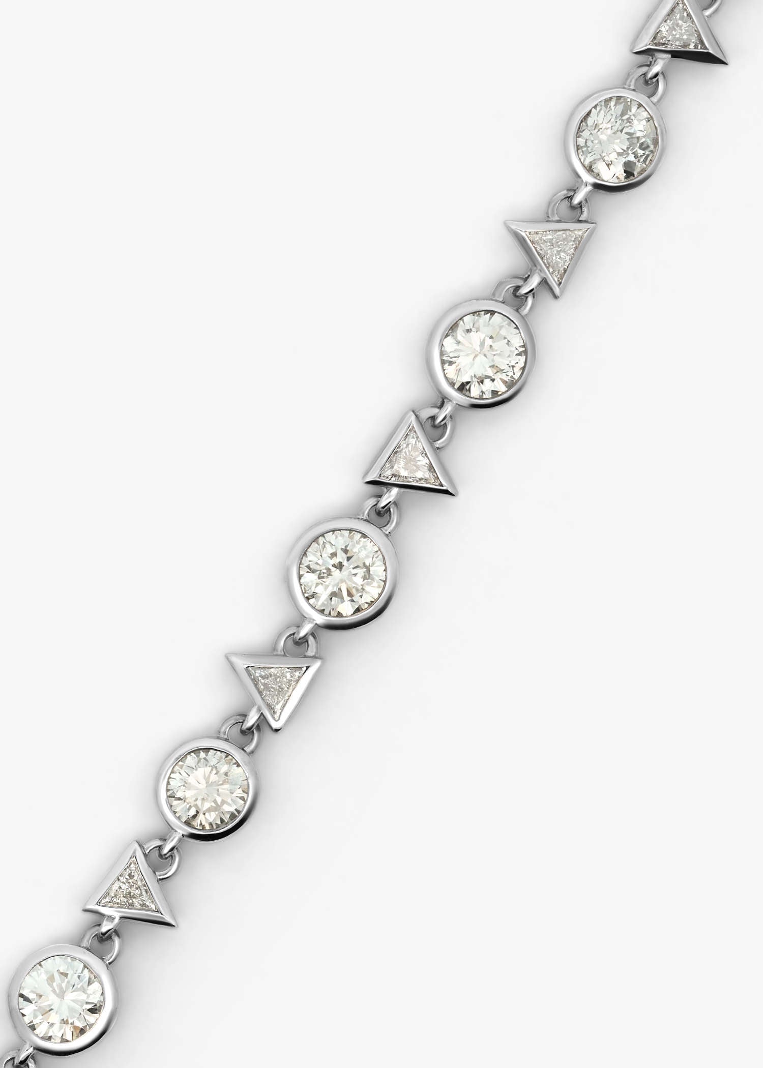 Platinum diamond tennis bracelet displayed on white background.