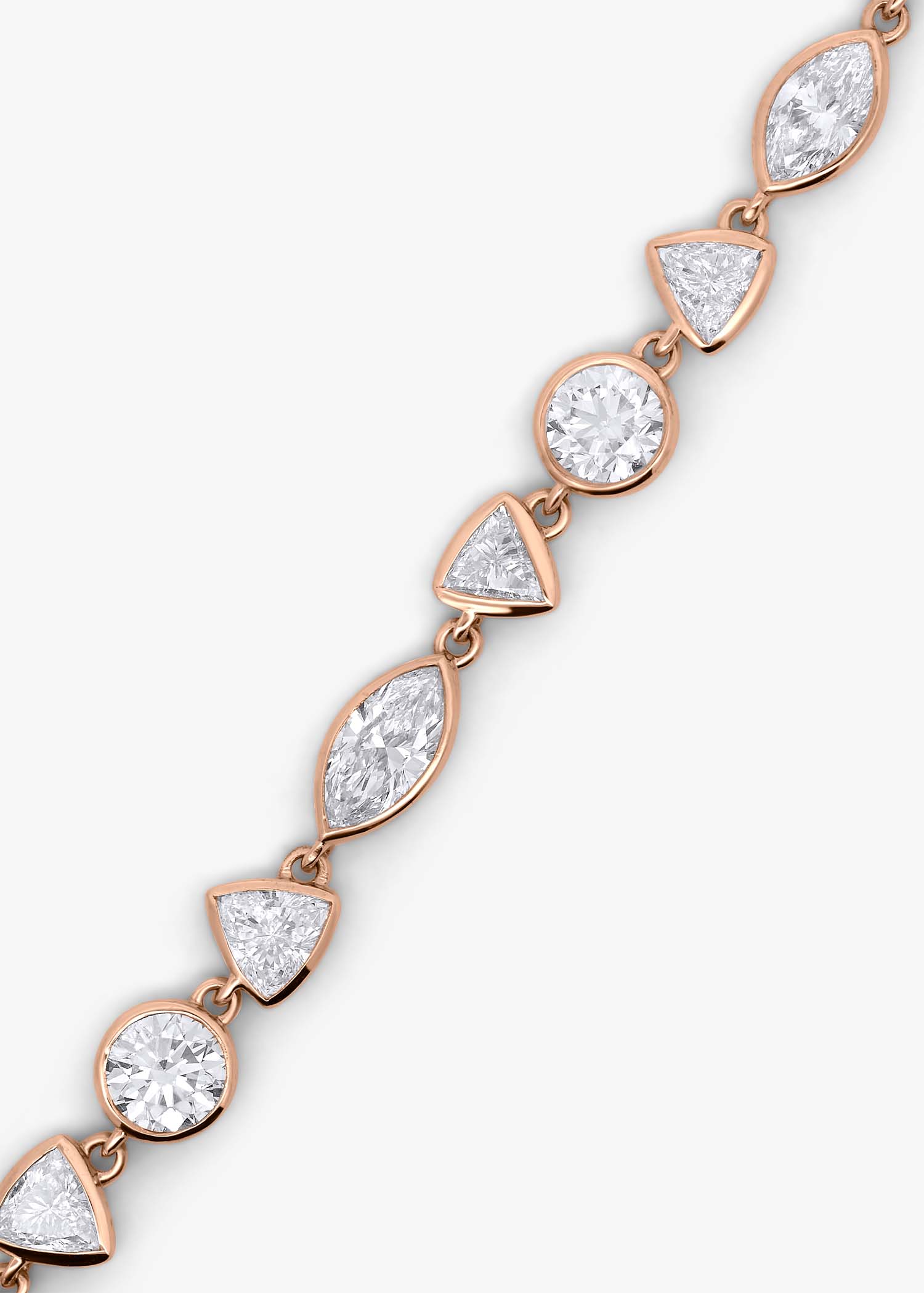 Gold chain bracelet on a white background.