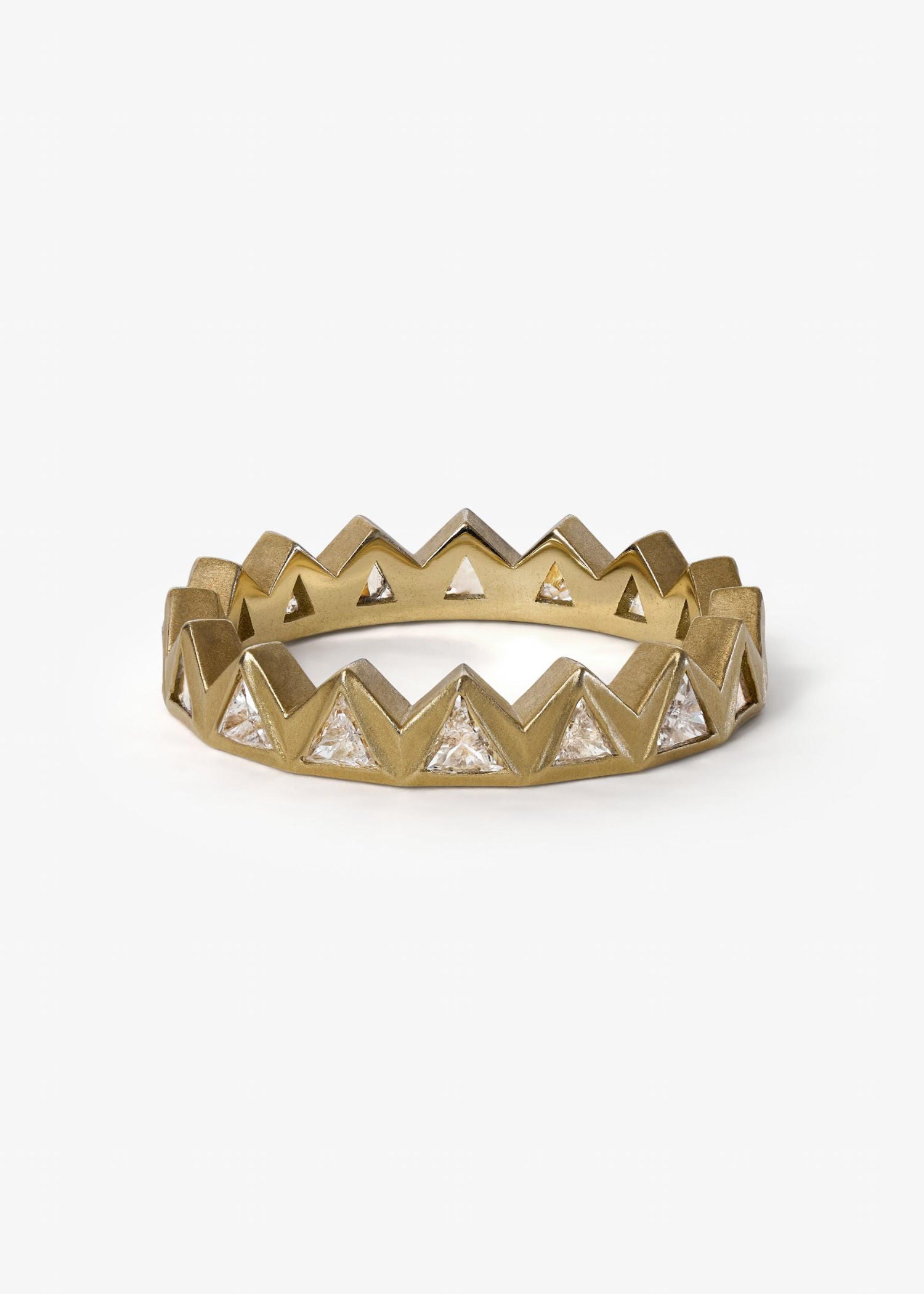 Gold and silver chevron patterned ring on a white background.
