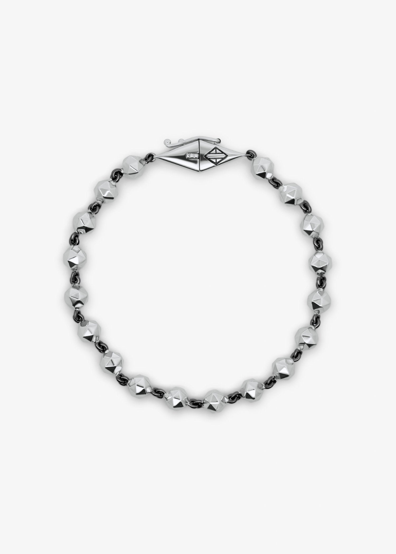 Bracelet with black and silver beads on a white background.