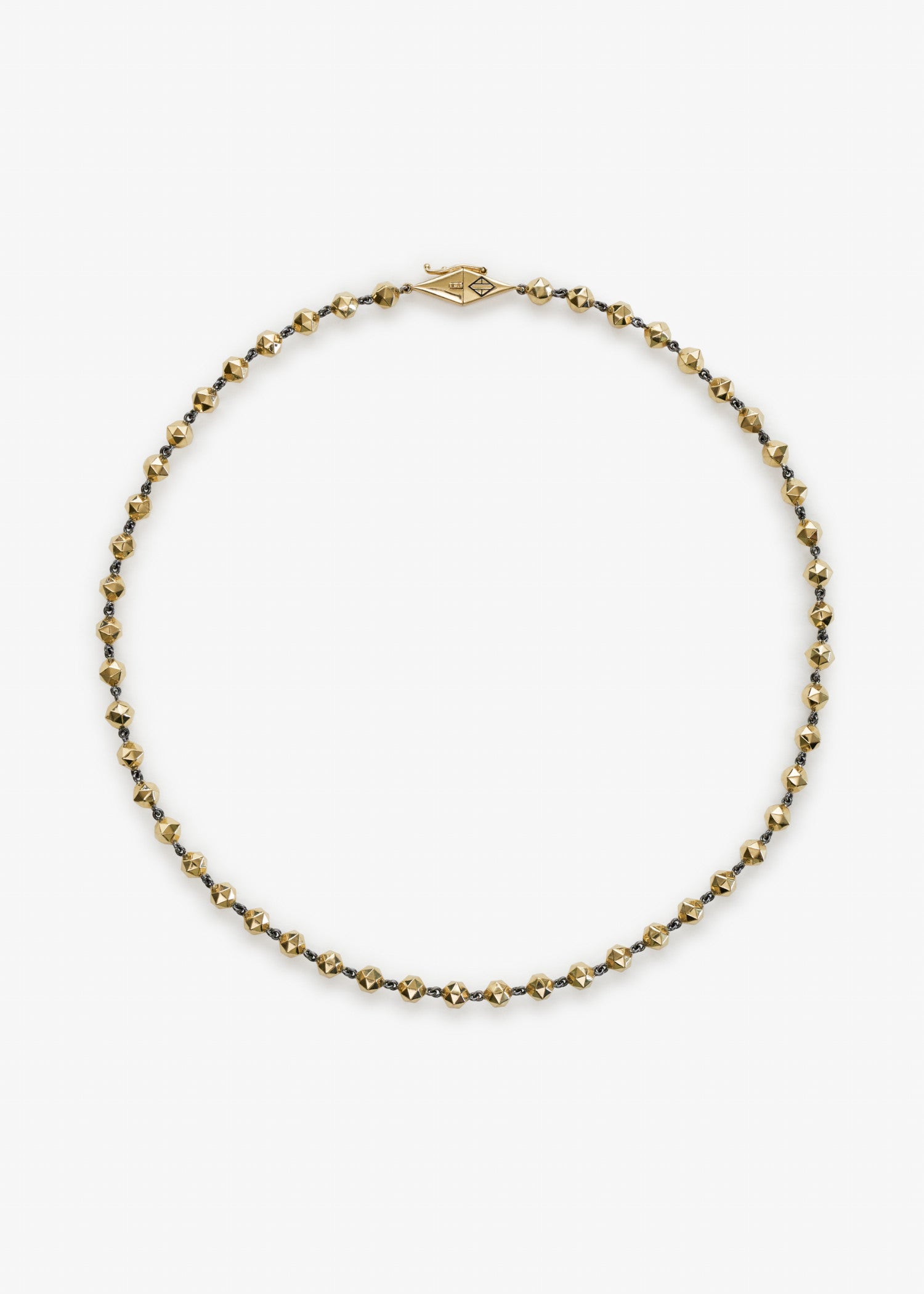 Necklace with gold and silver beads on a white background.