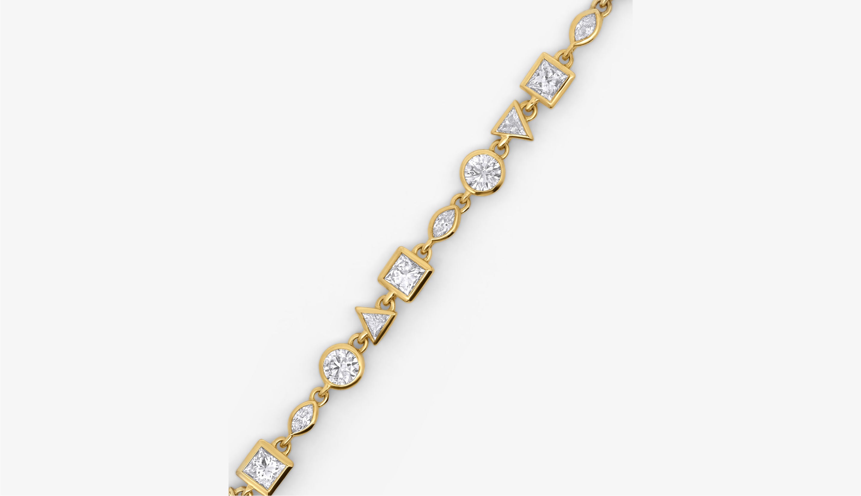 Blonde woman with slicked-back hair wearing a black strapless top and a choker necklace with a large light blue gemstone.