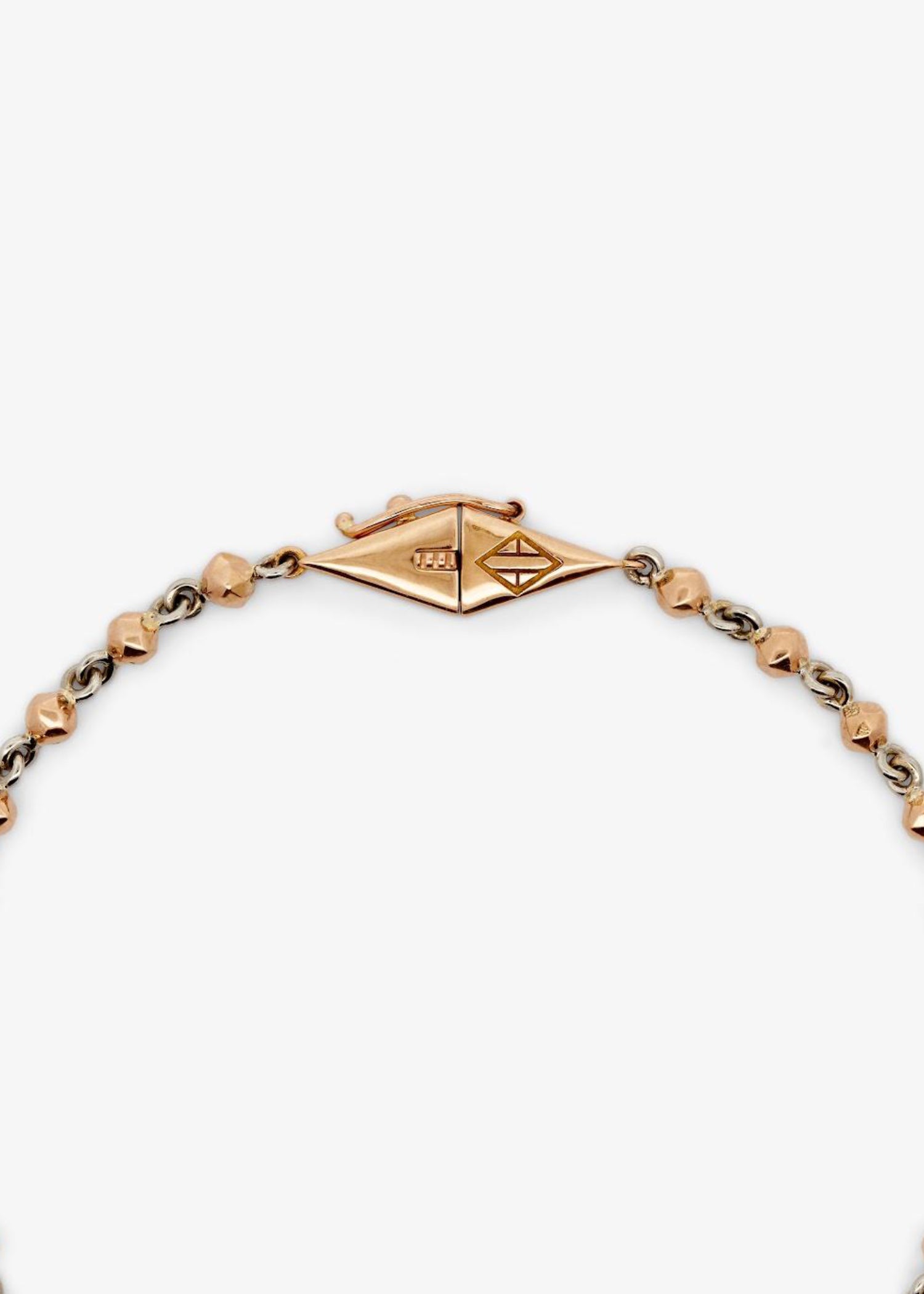 Mini Bead bracelet in 18k rose gold with a delicate beaded design.