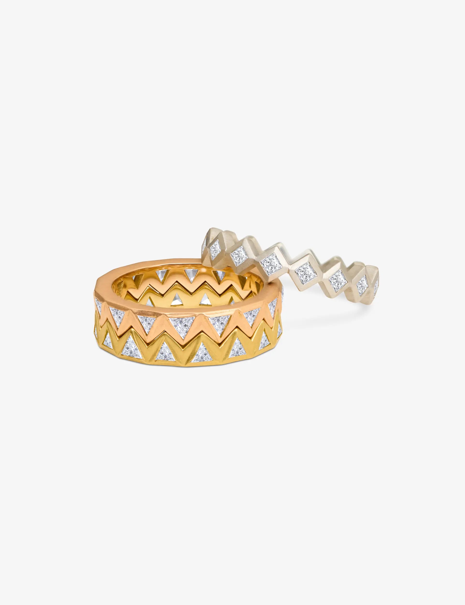 Jigsaw Diamond Ring featuring interlocking bands with diamond accents in a contemporary design.