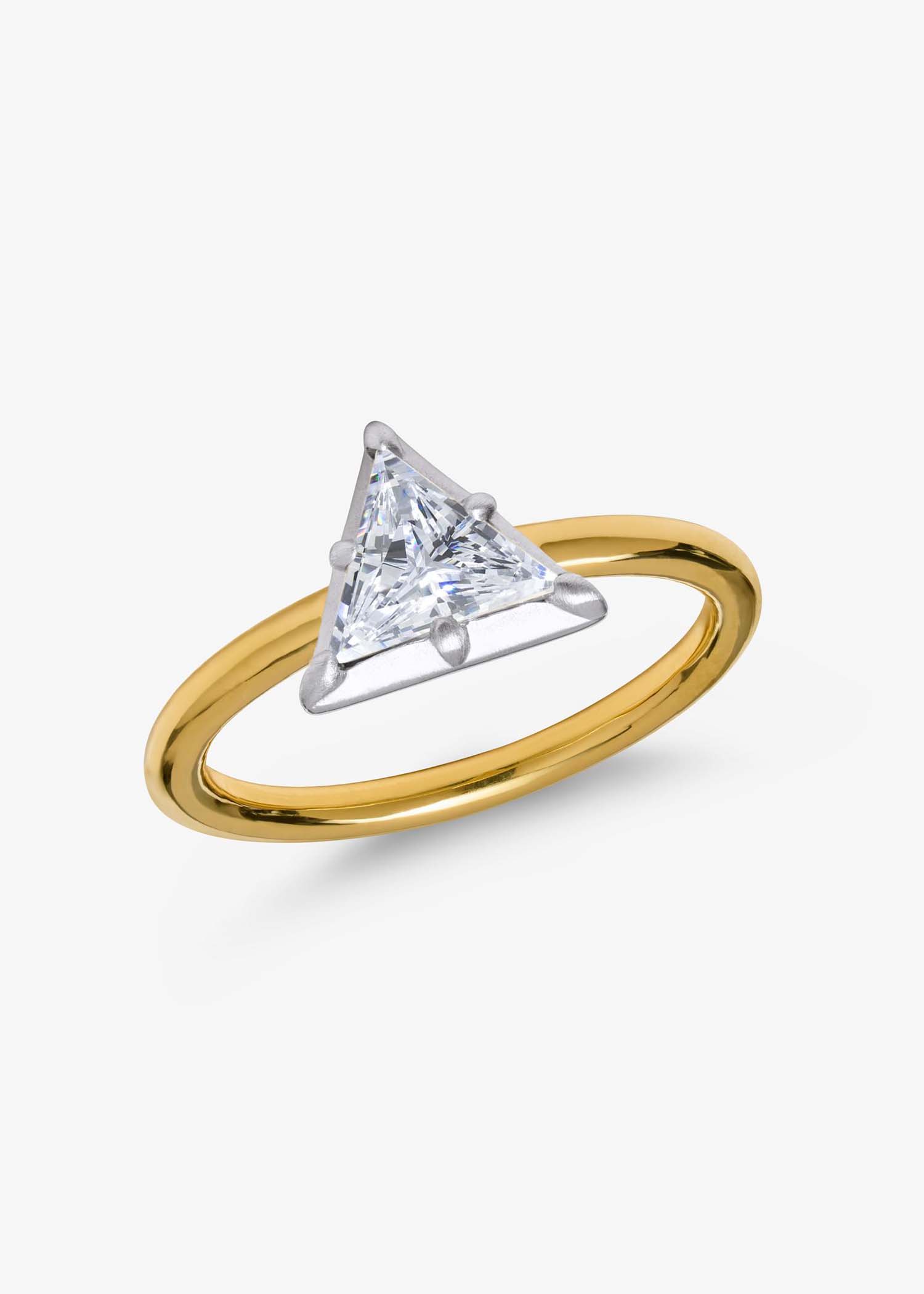 Lume Solitaire Diamond Ring with a triangle-cut diamond set in a minimalist gold band.