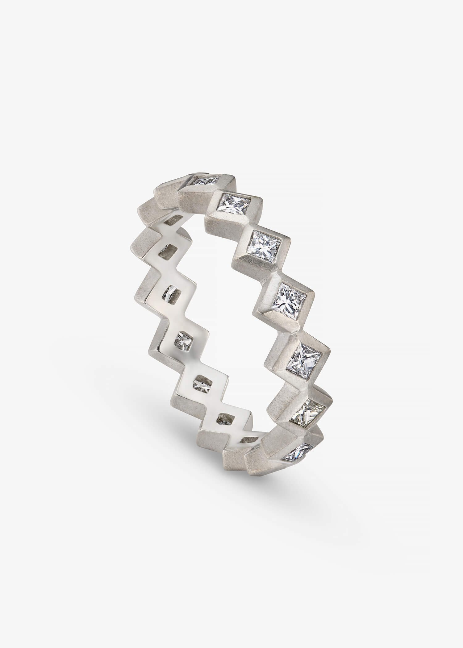 Gold and silver chevron patterned ring on a white background.