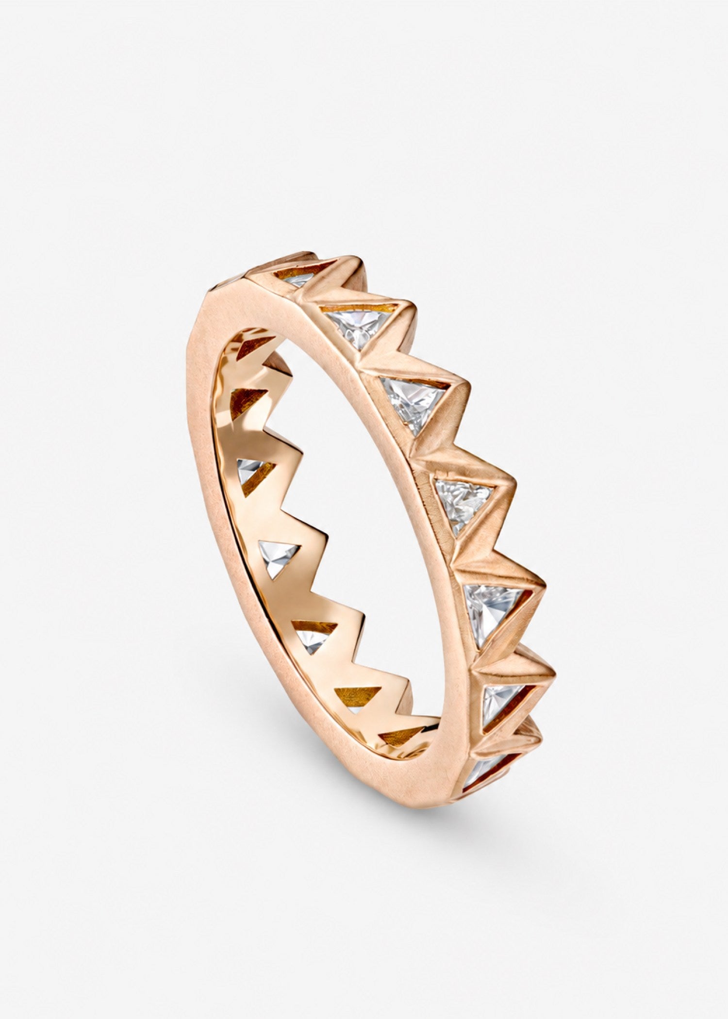 Gold and silver chevron patterned ring on a white background.