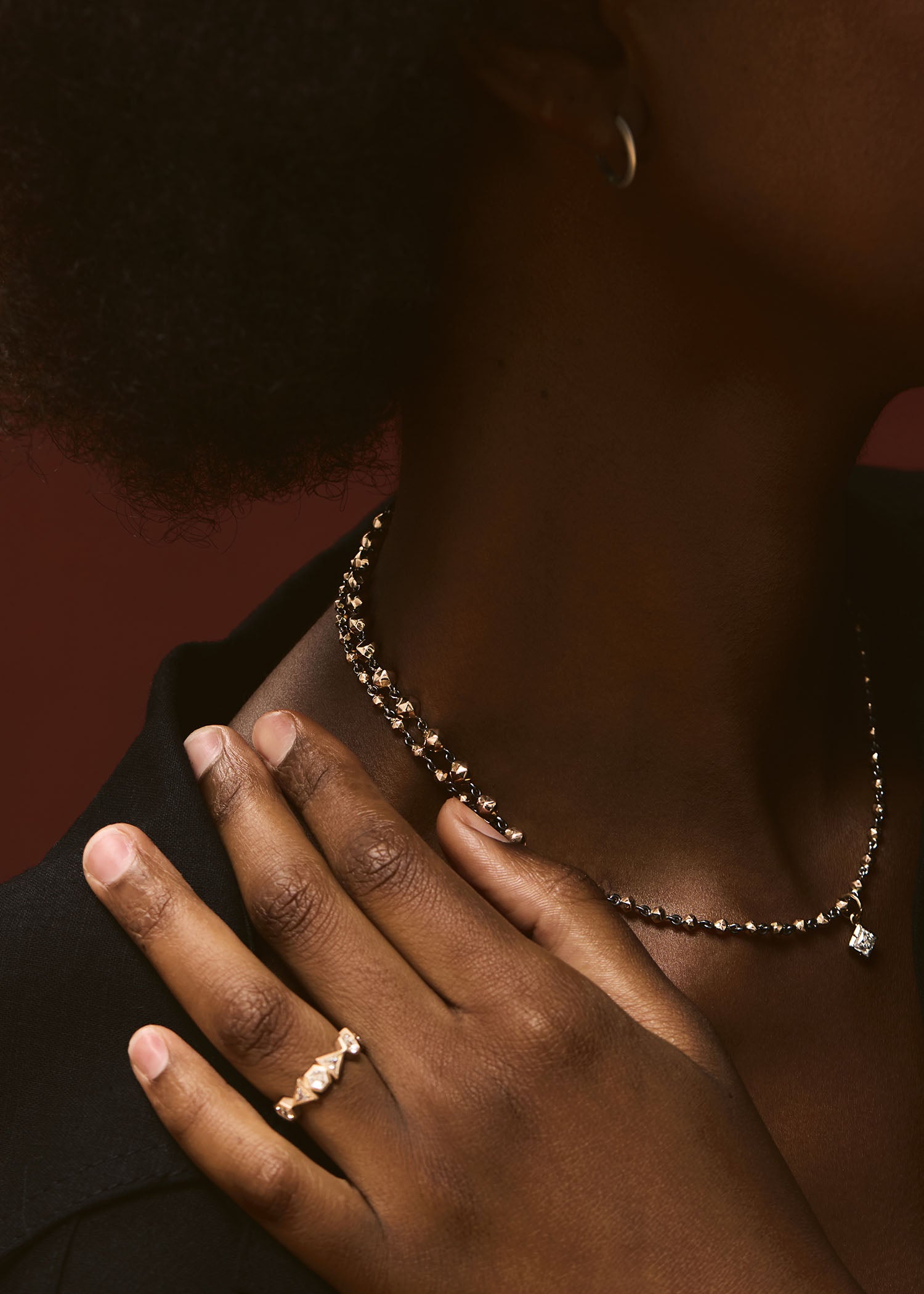 Mini Bead bracelet in 18k rose gold worn on the wrist with a minimalist fine jewelry design.
