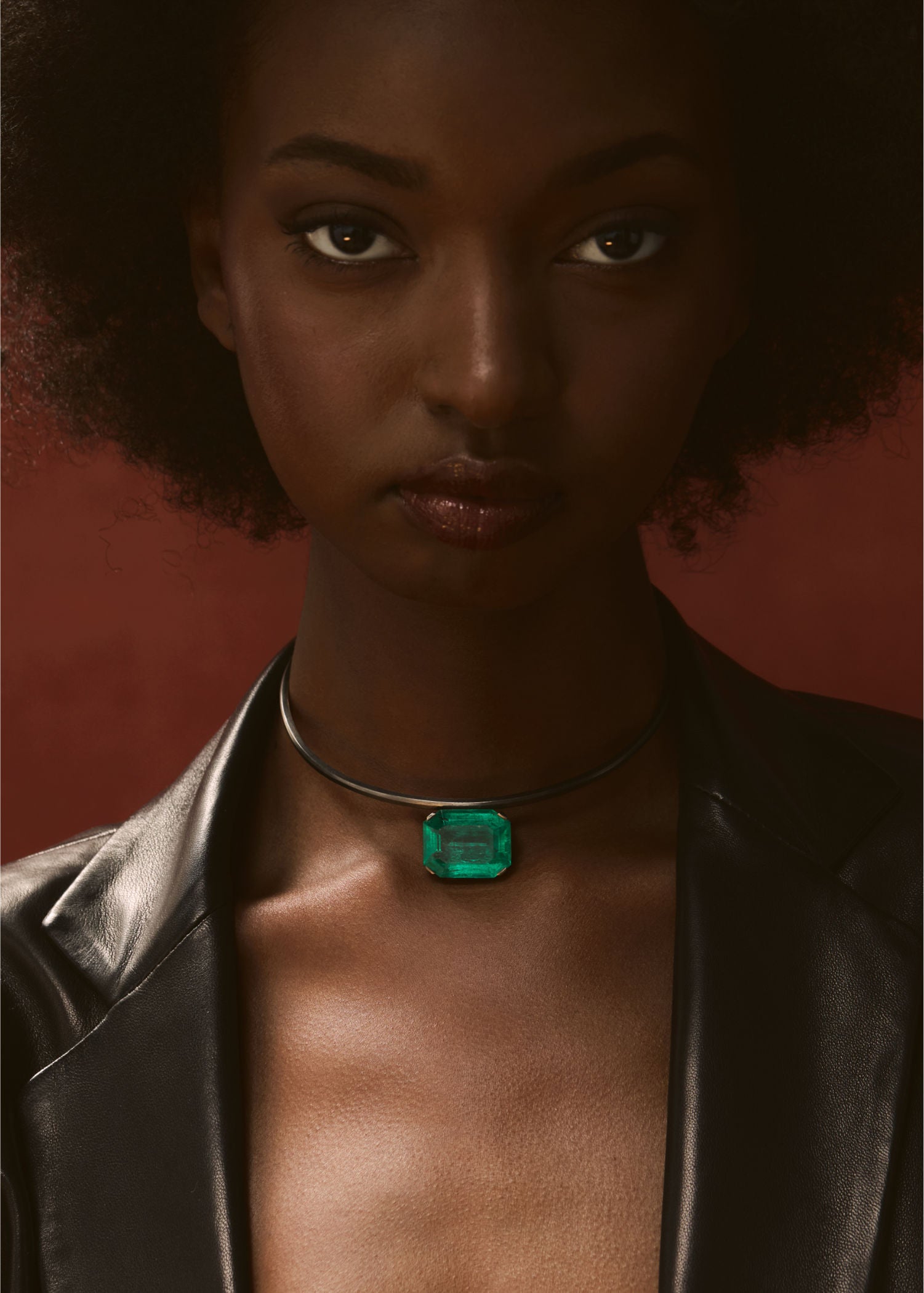 Cleopatra Collar worn by a model showcasing a bold gemstone statement necklace.