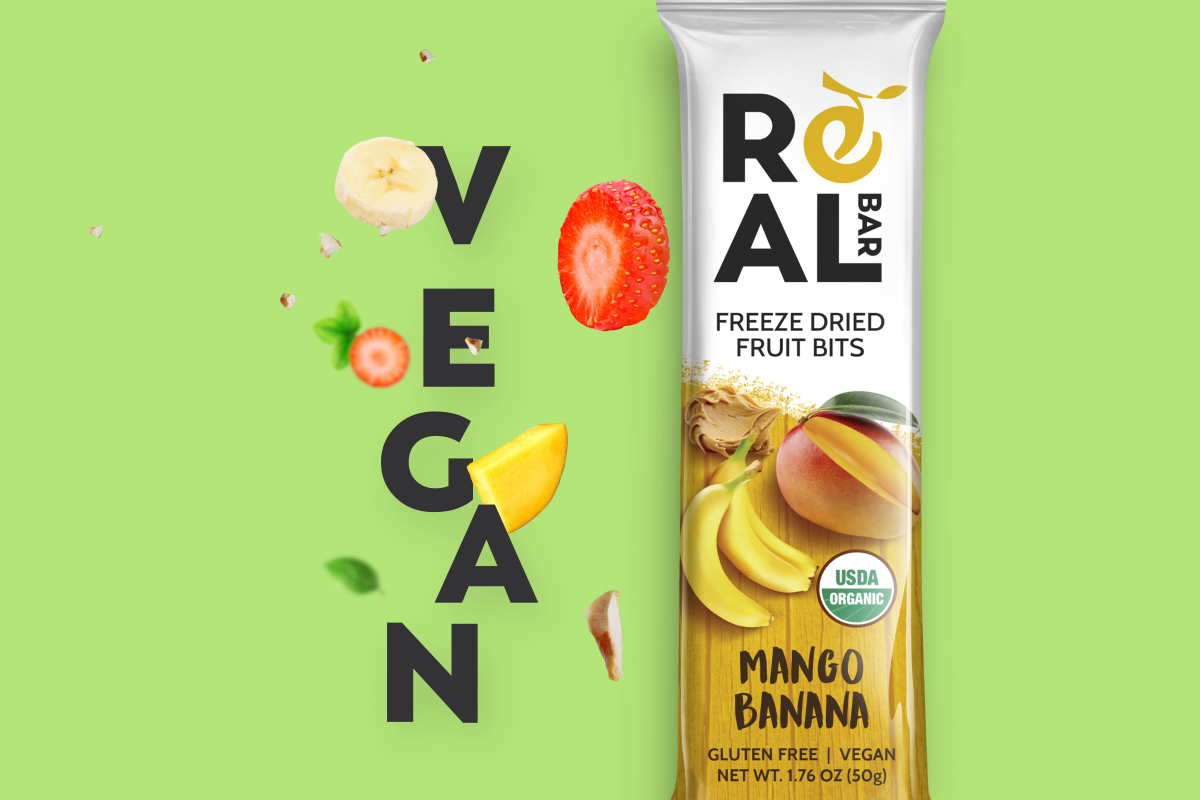 The RealBar, the word 'vegan', and various fruits and nuts flying around.