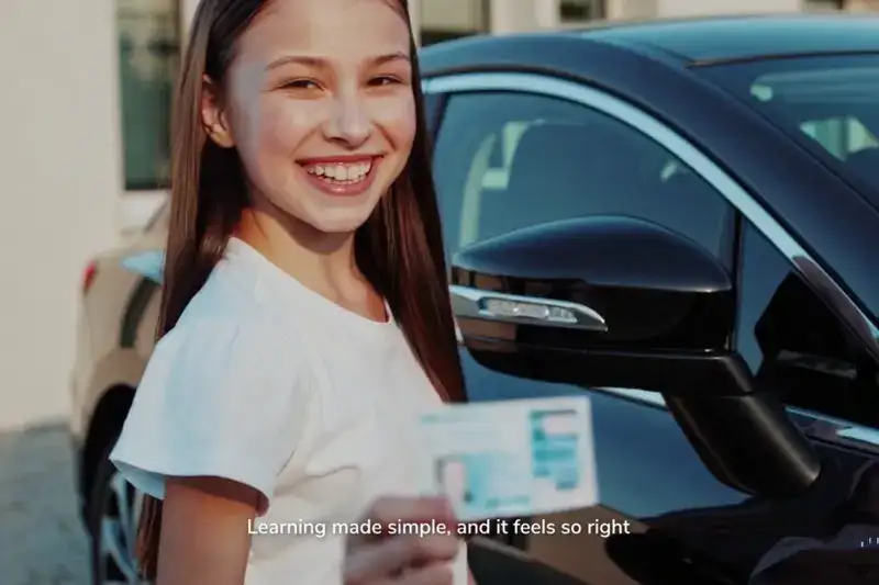 Happy AI-generated teenage girl holding her new driver’s license.