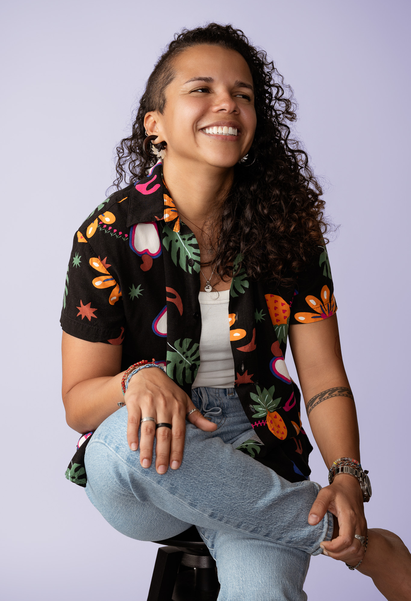 A studio photo of Caren smiling.