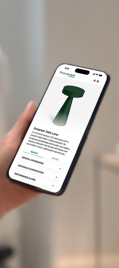 Smartphone displaying an online product page for an Evergreen Table Lamp with a dark green conical design.