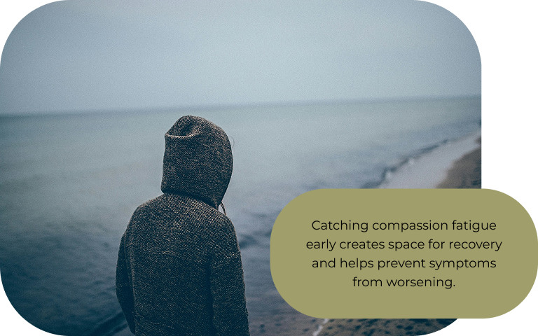 Image: A person walking on a cold, foggy beach. Text: Catching compassion fatigue early creates space for recovery and helps prevent symptoms from worsening.