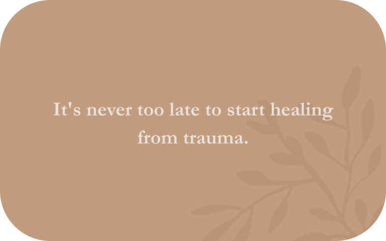 Image: White text over a peach-colored background. Text: It's never too late to start healing from trauma.