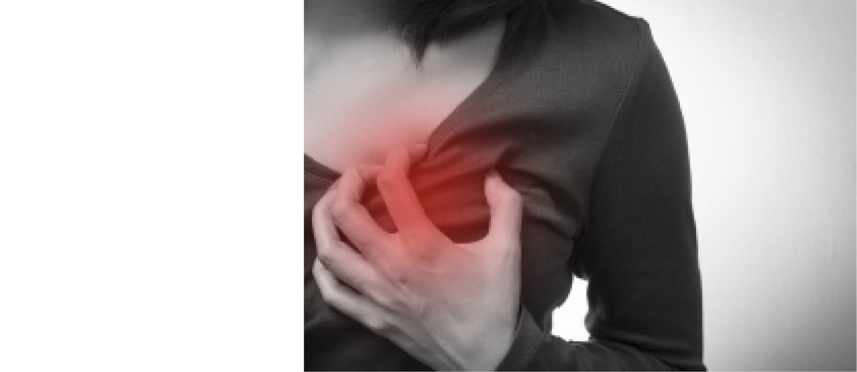 Person clutching their chest in what looks like a painful manner