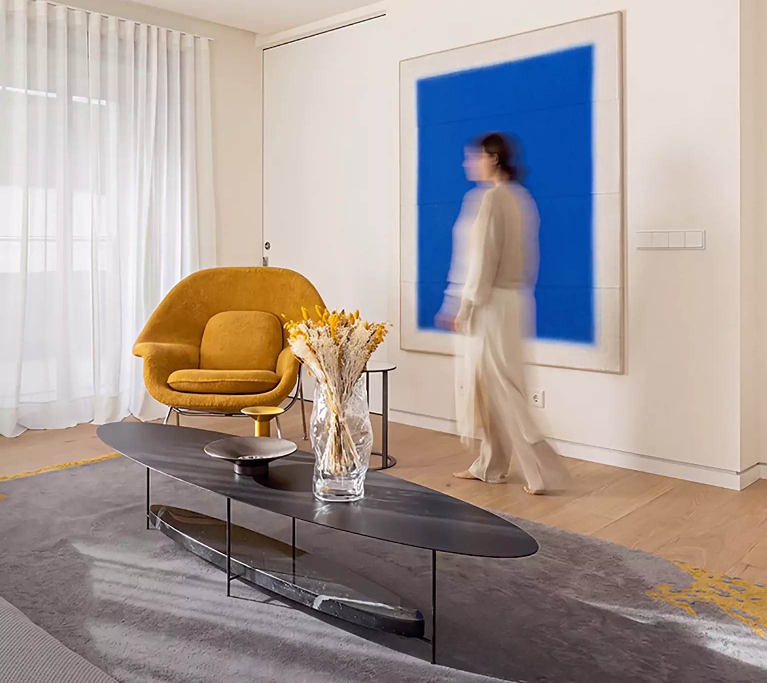 Living room with floor-to-ceiling glazing and oak floors
