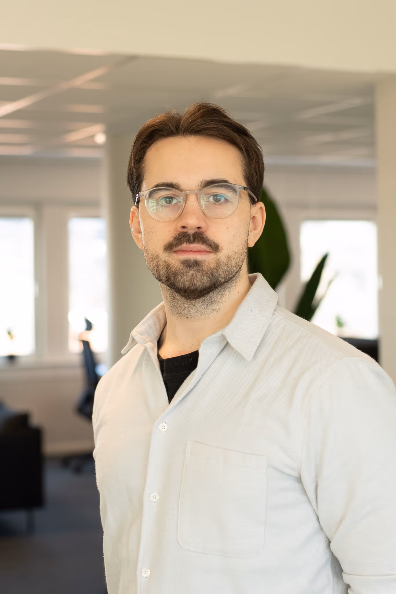 Find My Factory team member in modern office environment