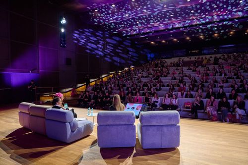 image of a diverse group of professionals in a meeting room for a digital marketing & advertising agency