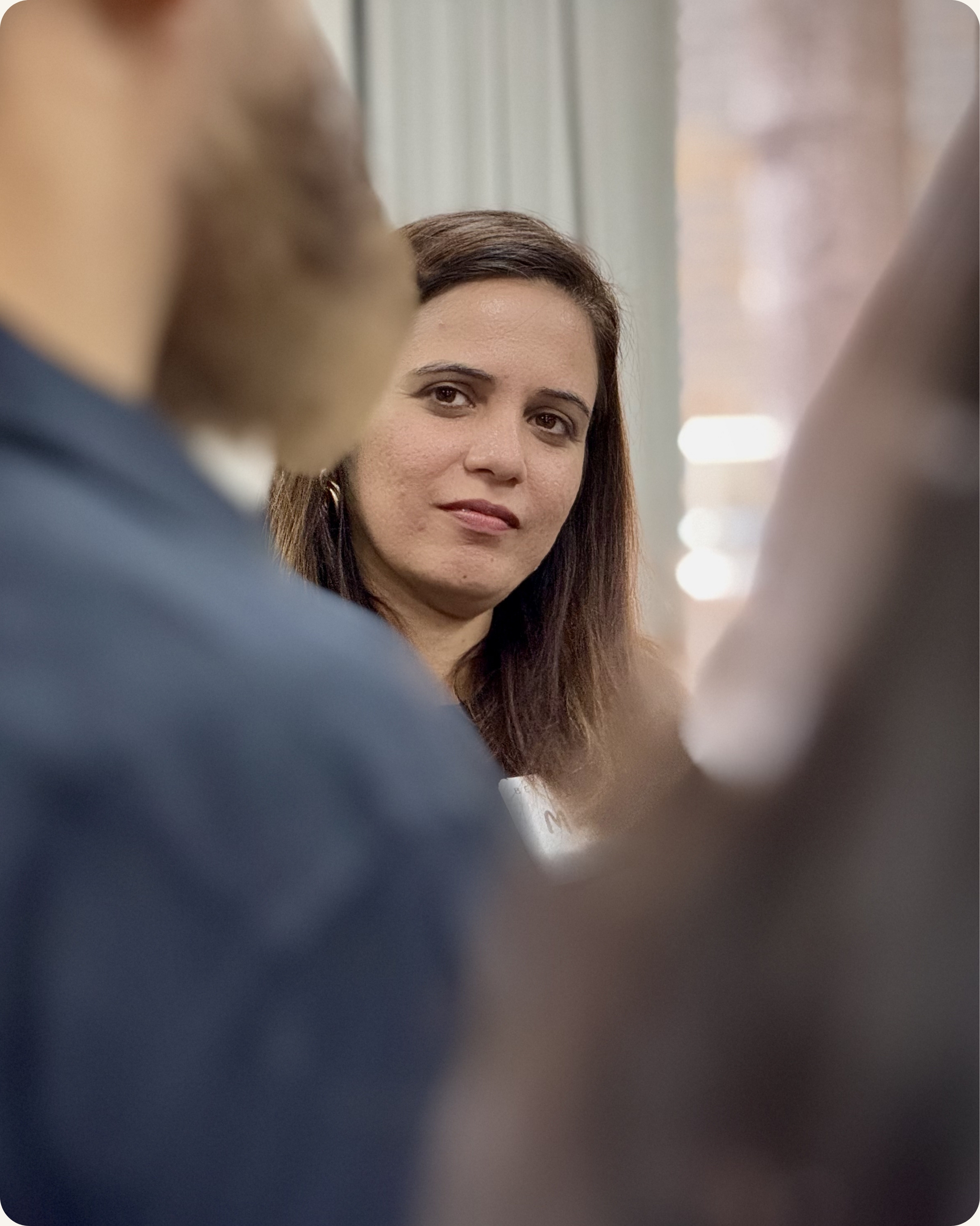 Senior leader practicing active listening during executive presence training session in India — CoachVikram & Company