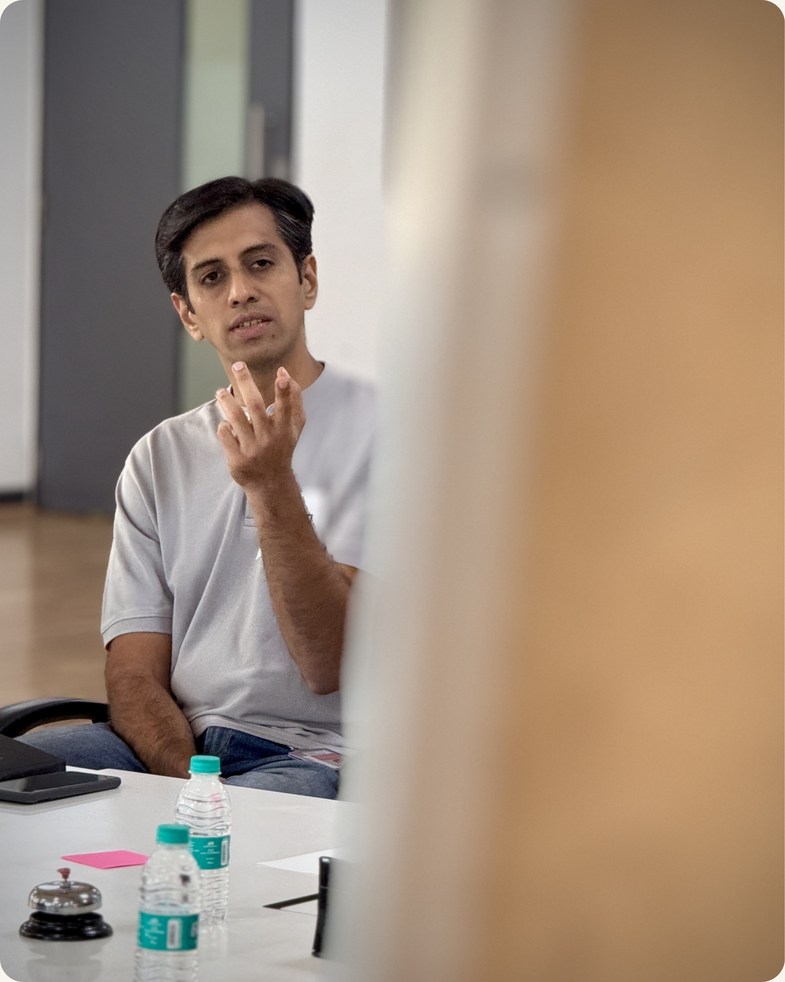 Senior leader speaking with authority during executive presence training session — CoachVikram & Company Washington DC