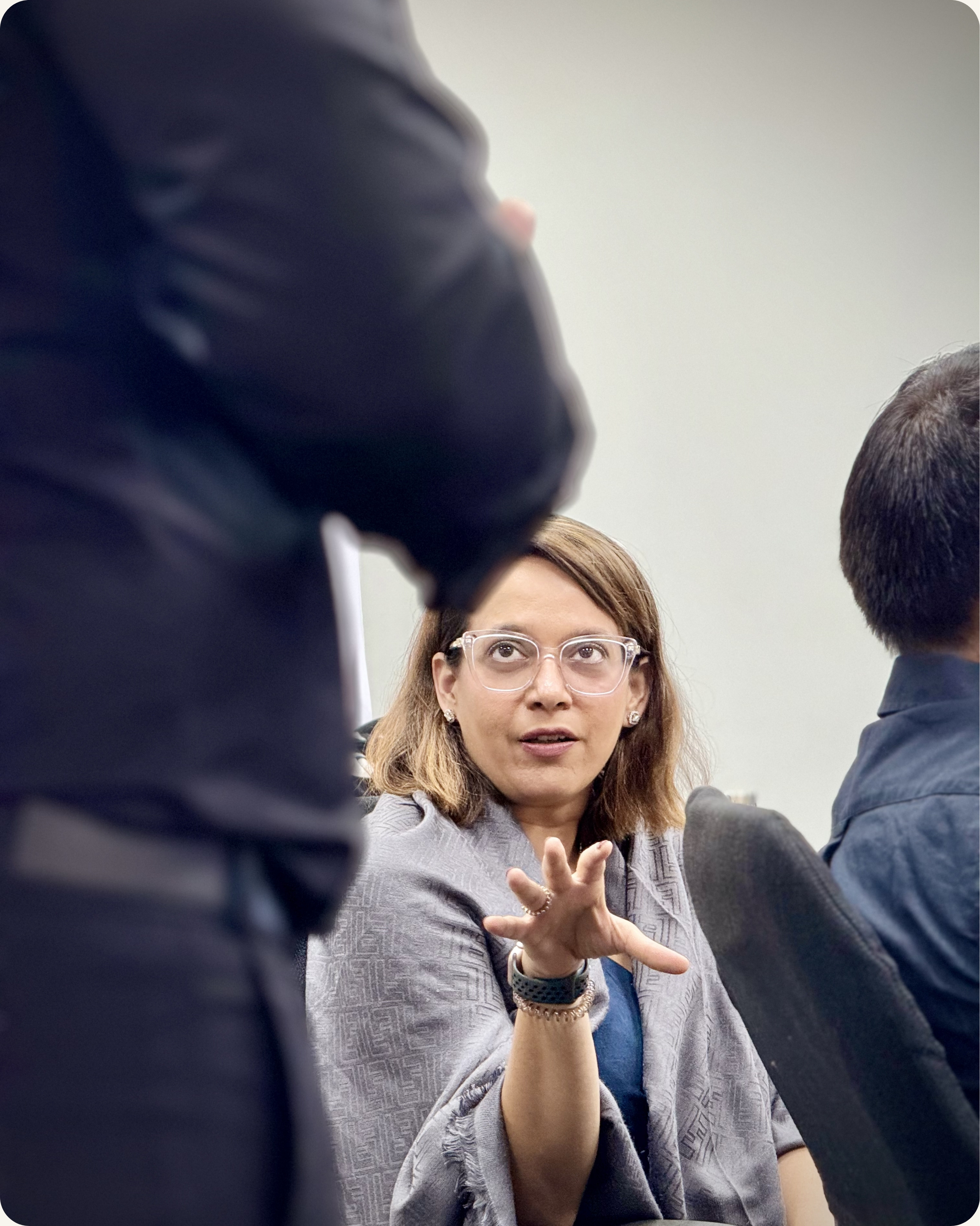 Senior leader speaking expressively during executive presence training session in Washington DC — CoachVikram & Company