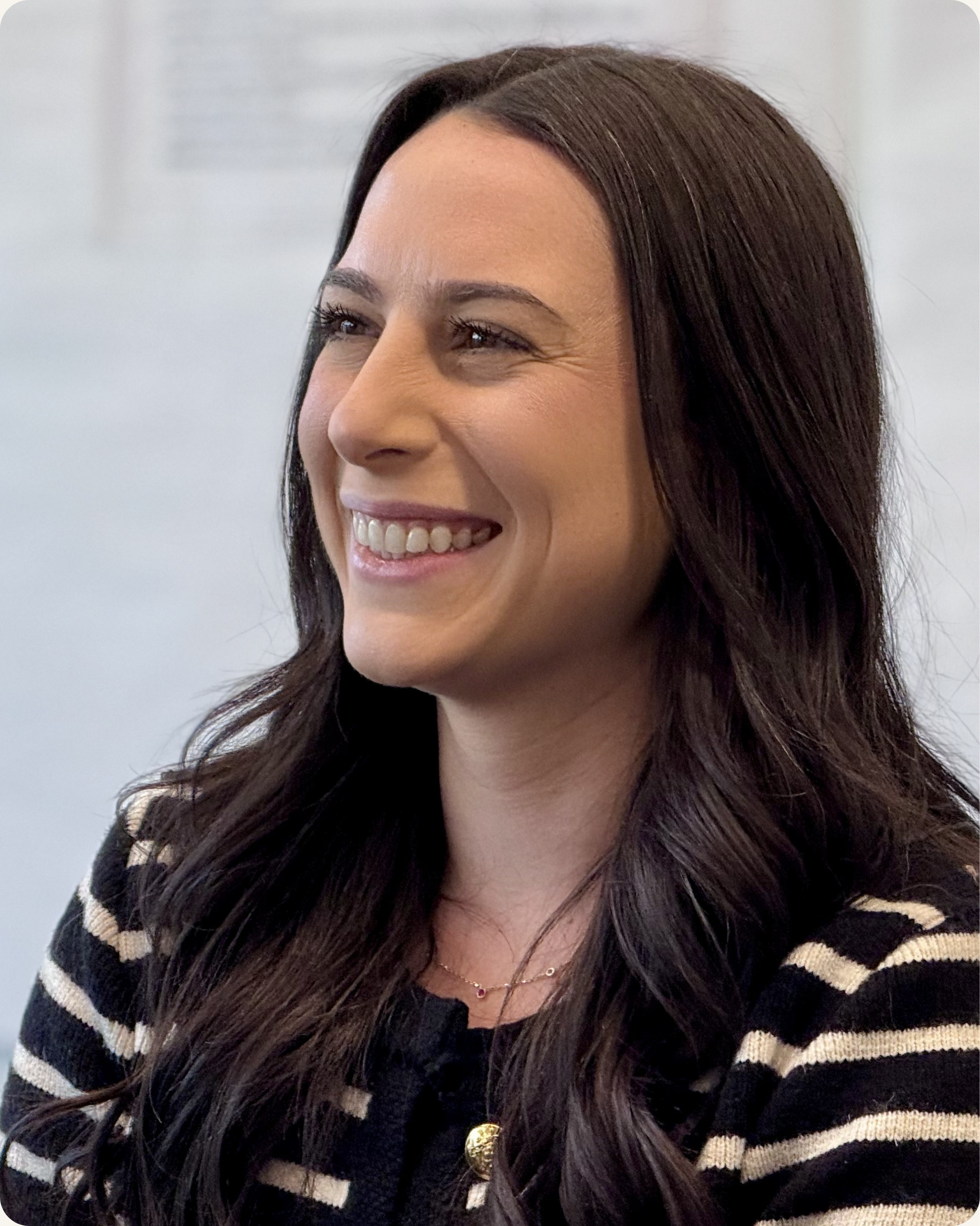 Senior leader smiling confidently during executive presence training session in Seattle Washington — CoachVikram & Company