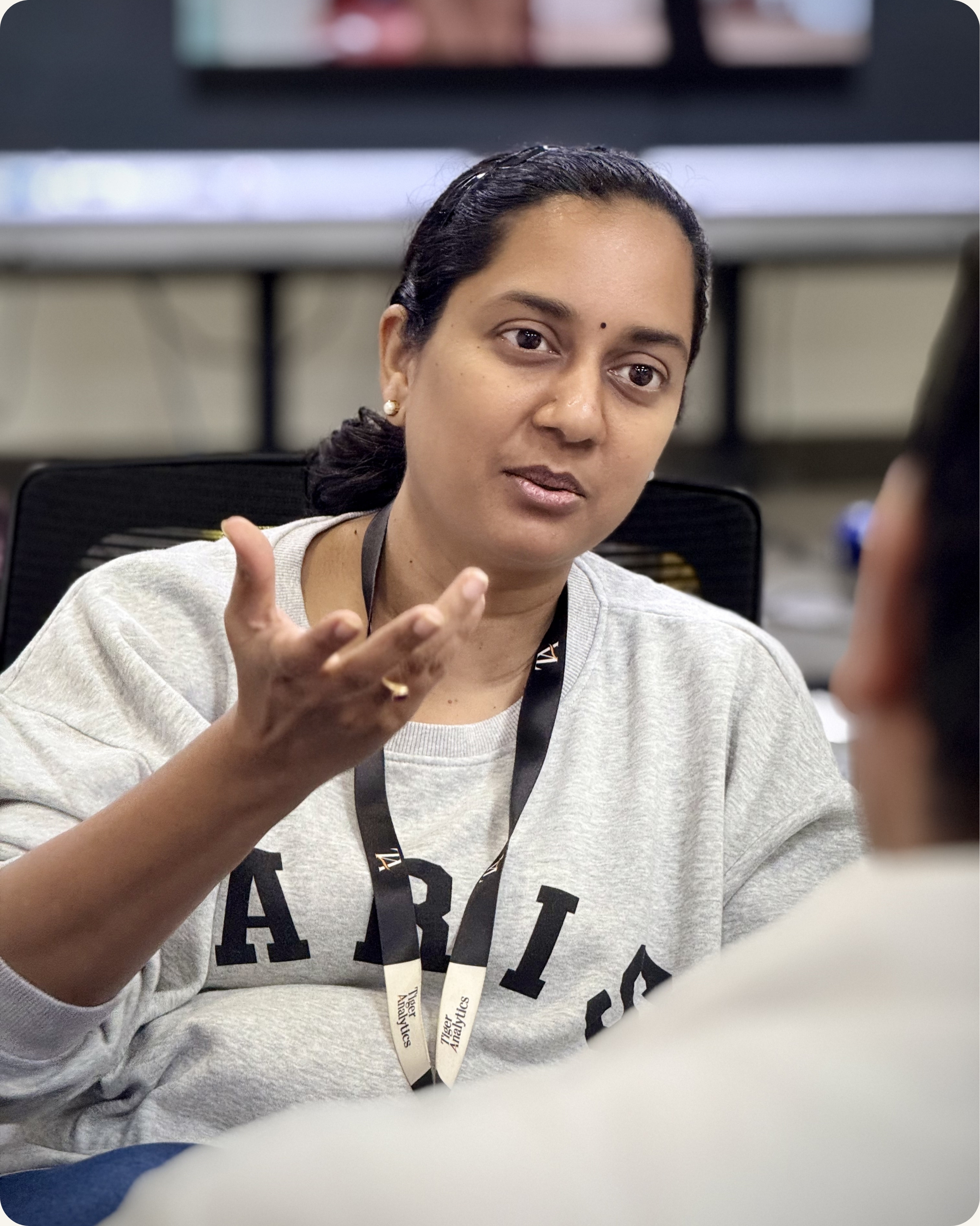 Senior leader speaking expressively during executive presence training session in Washington DC — CoachVikram & Company