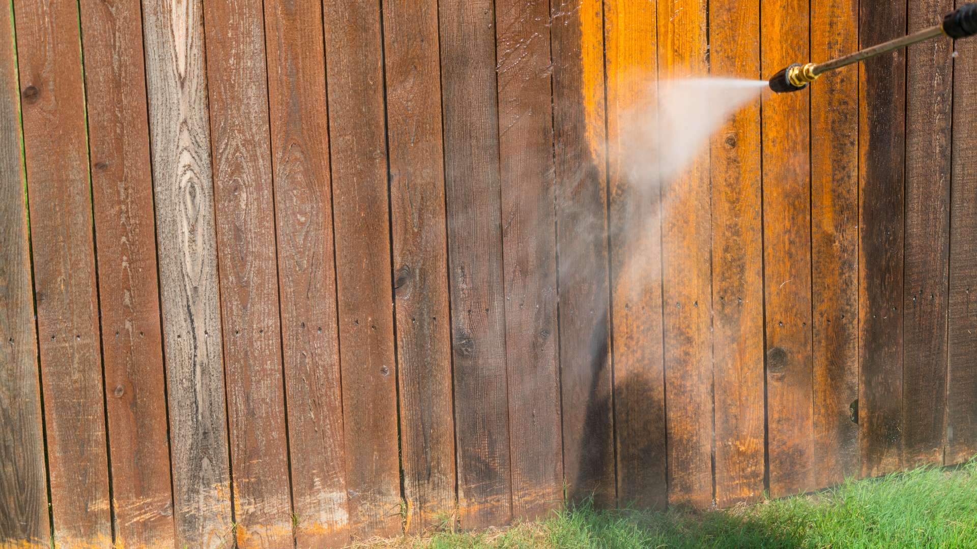 Wood and vinyl fence washing