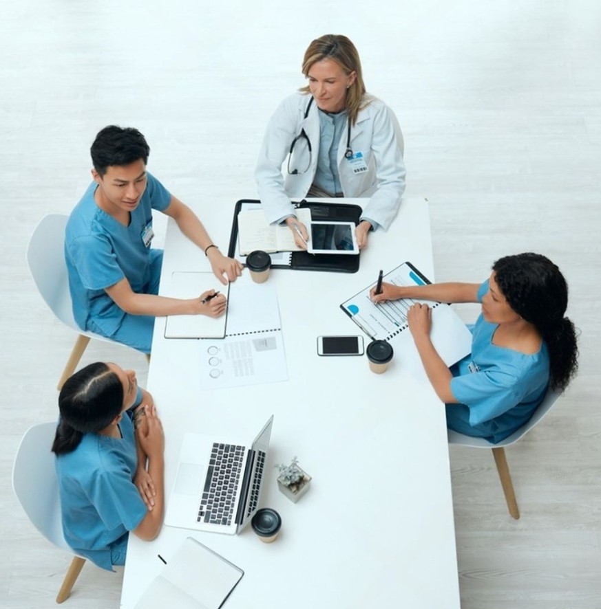 Mental health group practice team meeting on hiring, leadership, and operational strategies for expansion