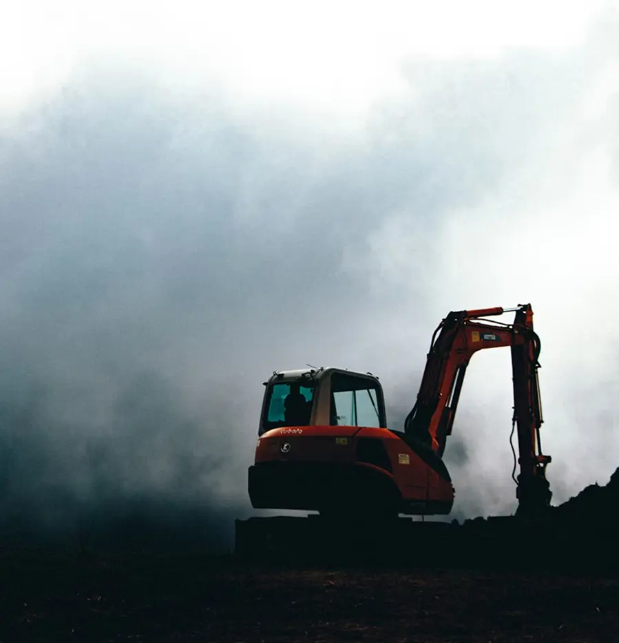 Digger in mist.
