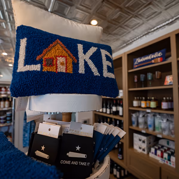 Colorful display of lake-themed gifts and Texas collectibles at Sinclair Market in Winnsboro, TX. Find cozy home décor, local souvenirs, and handcrafted items that celebrate East Texas charm and lifestyle.