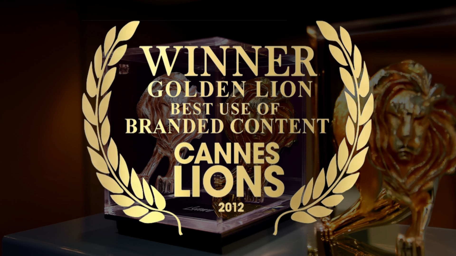 Close-up of Cannes Golden Lion Award trophy with dramatic lighting