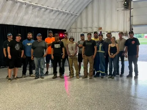 Group of fifteen people from the derby competition