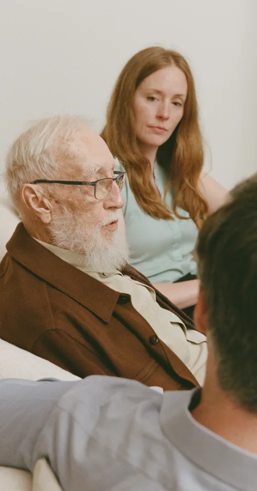 Alder care manager connecting with an elderly client during an in-home consultation