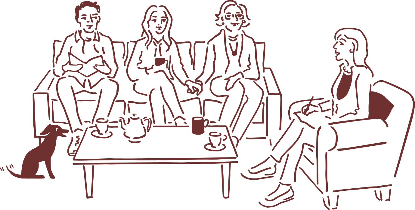 Four adults and a dog gathered around a coffee table, socializing and enjoying beverages together in a living room setting.