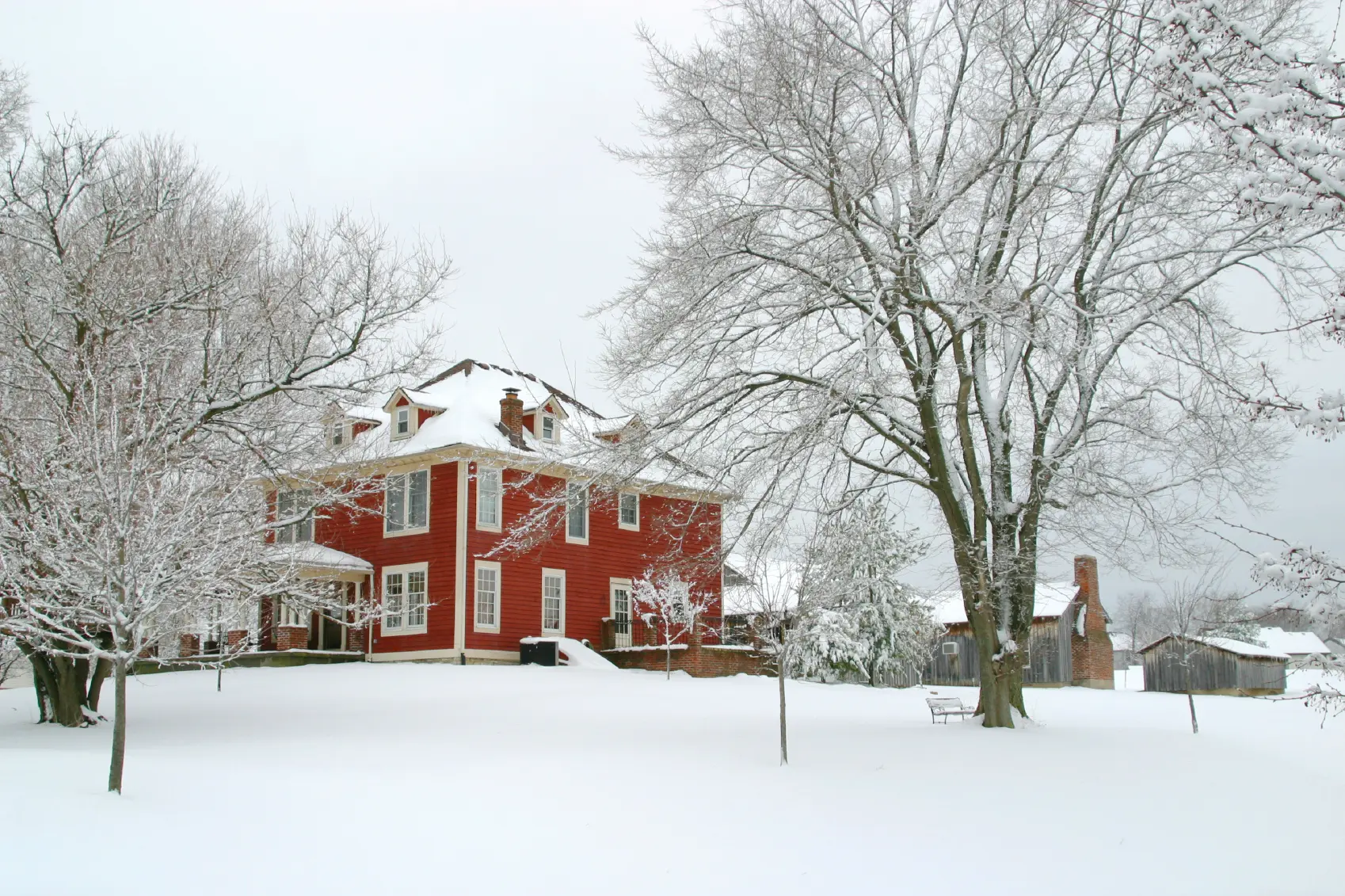 Snow-covered historic home in the New York and Westchester County area