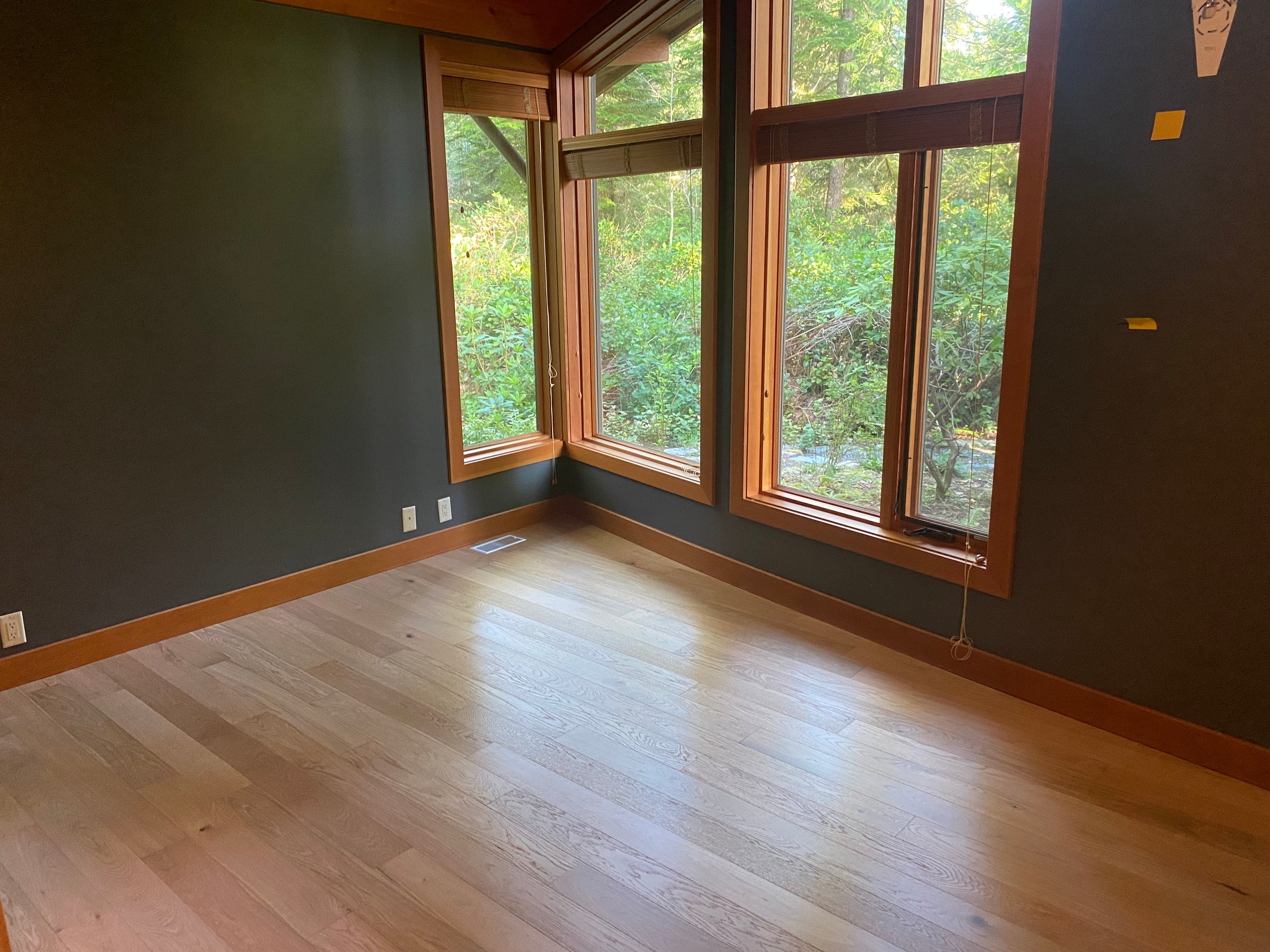 interior view of fine finishing around window trim and flooring