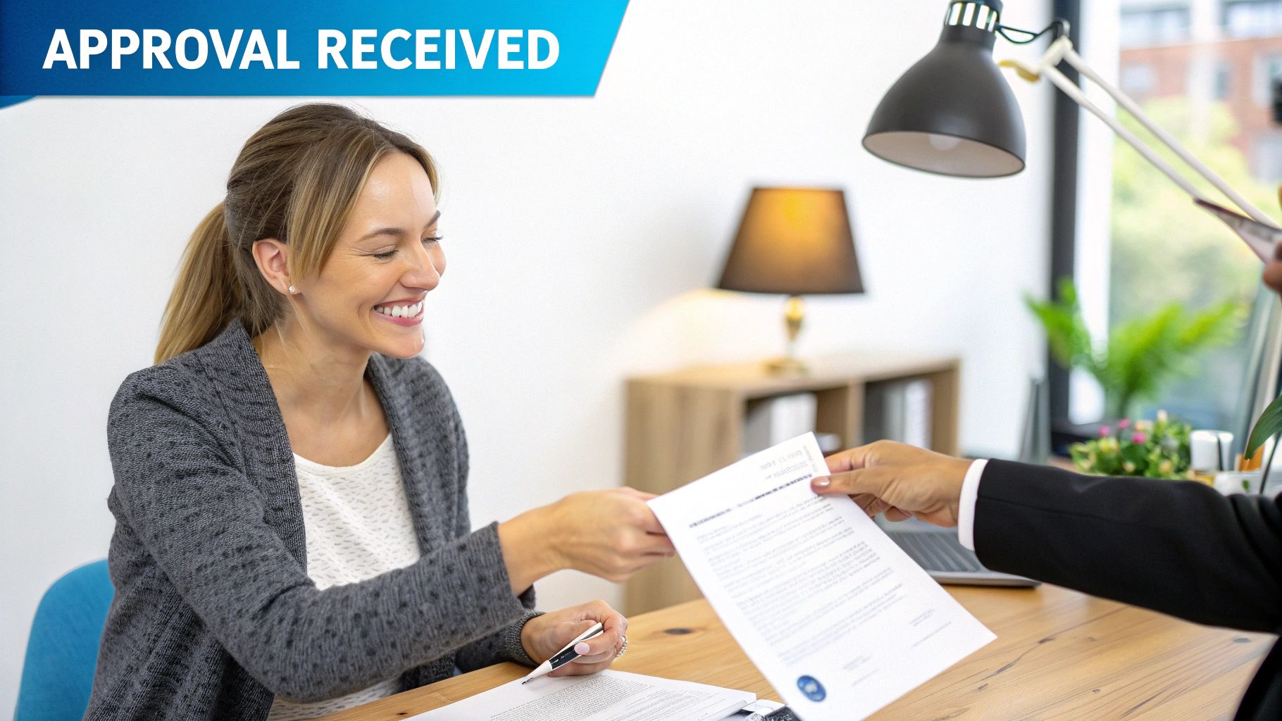 A person's hand holding a smartphone with a rental application form on the screen, ready to submit with a single tap.