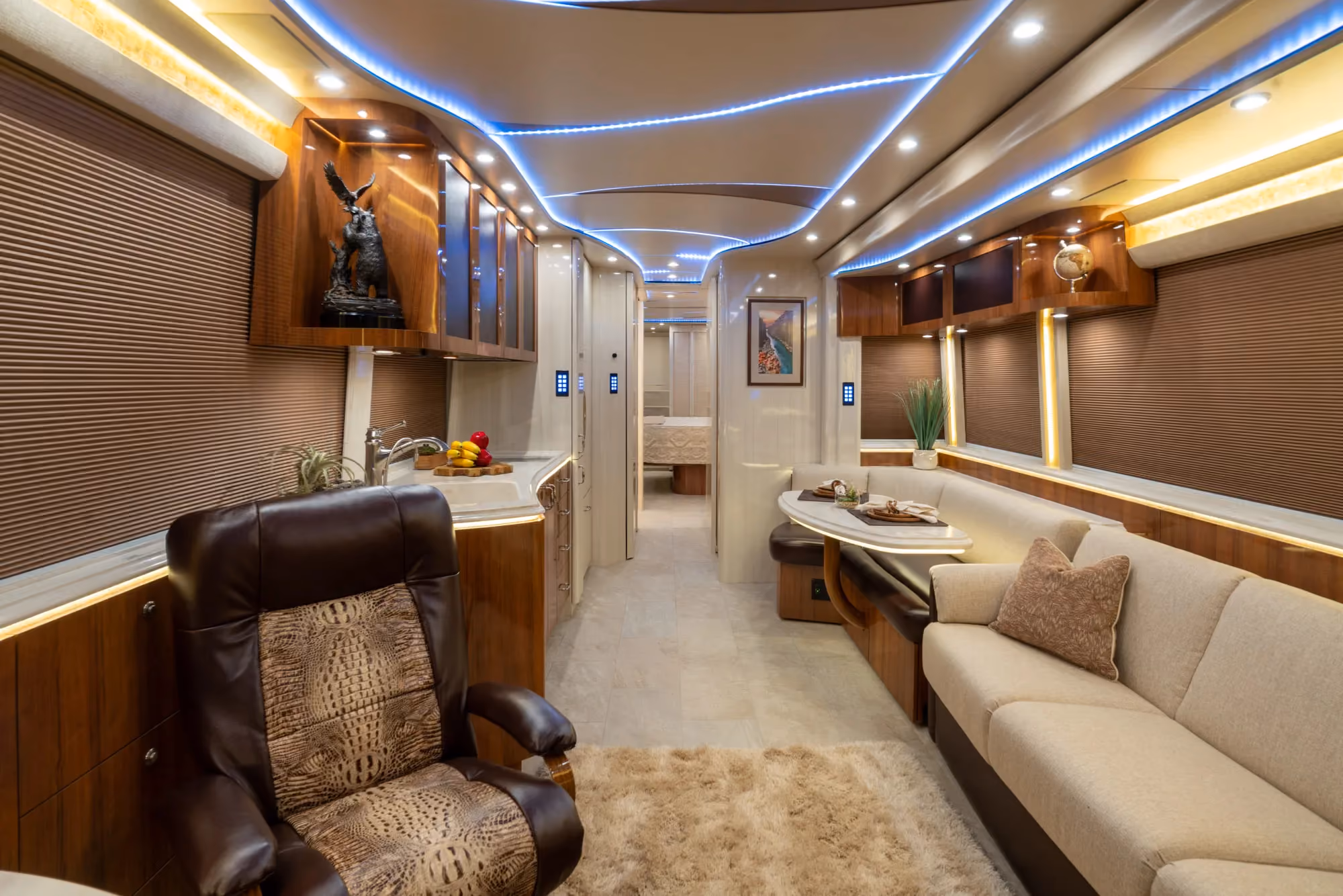 Interior salon of 2021 Marathon Coach 1325 with porcelain tile flooring and underfloor heating