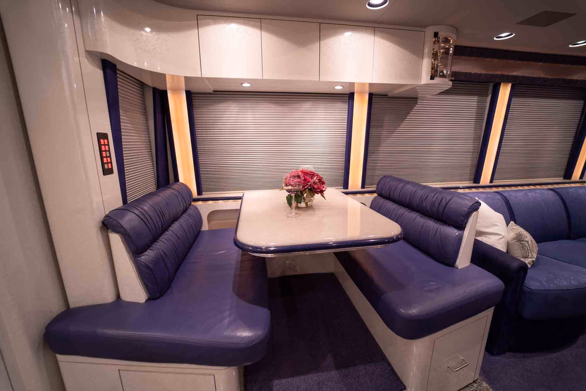 Interior stacked washer and dryer area in Marathon Coach 1038