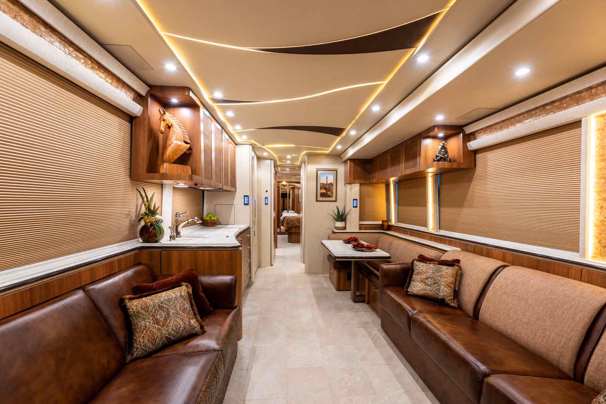 Interior salon of 2022 Marathon Coach 1350 with underfloor heating and porcelain flooring