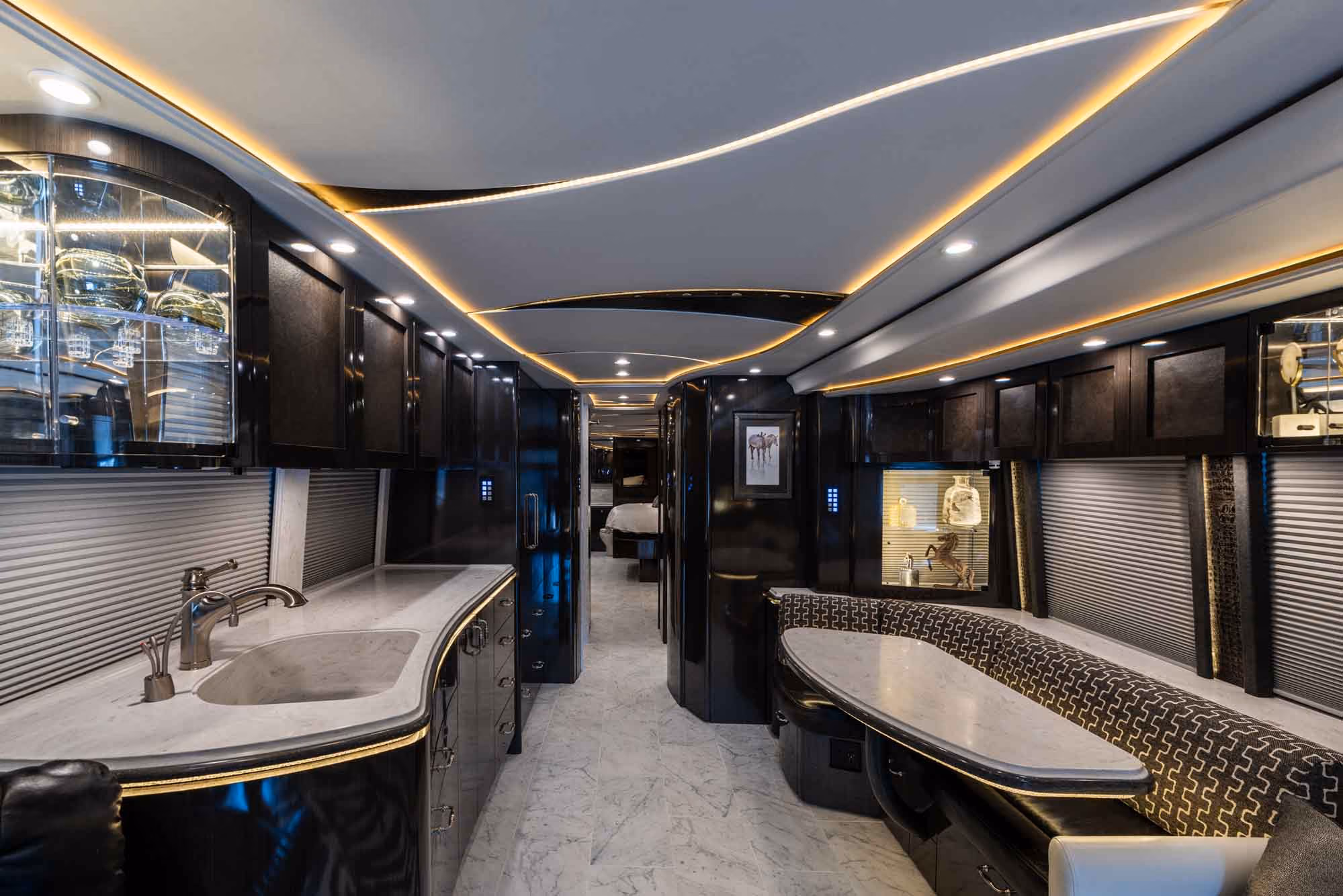 Interior galley kitchen with Fisher Paykel fridge in Marathon Coach 1321