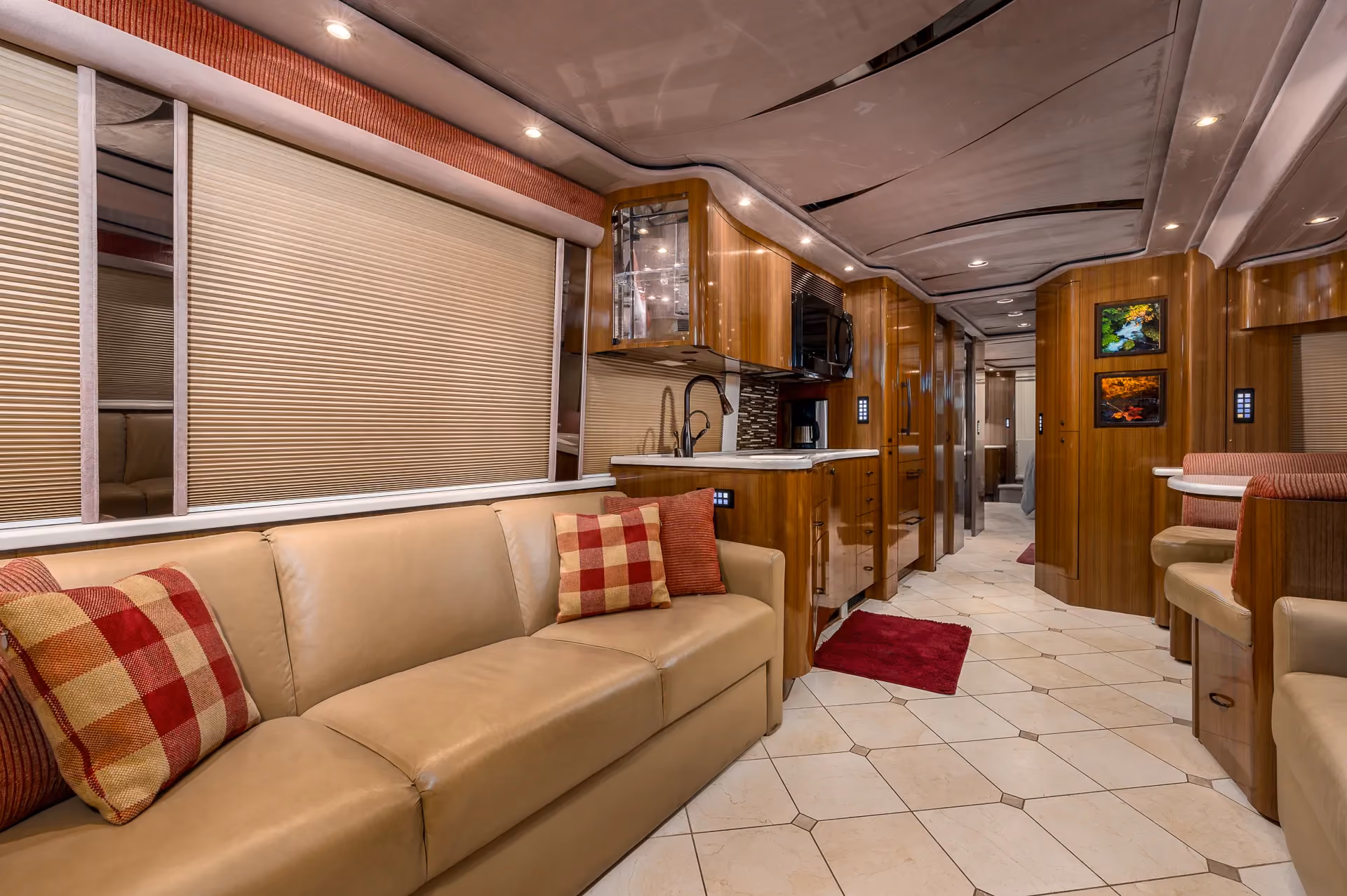 Interior living area with electric sleeper sofas in Marathon Coach 1208