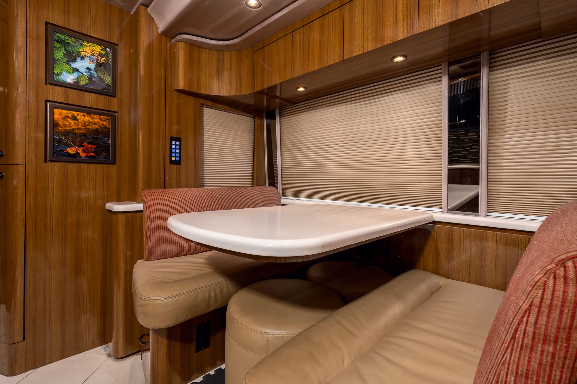 Exterior bay refrigerator and outdoor entertaining area on Marathon Coach 1208
