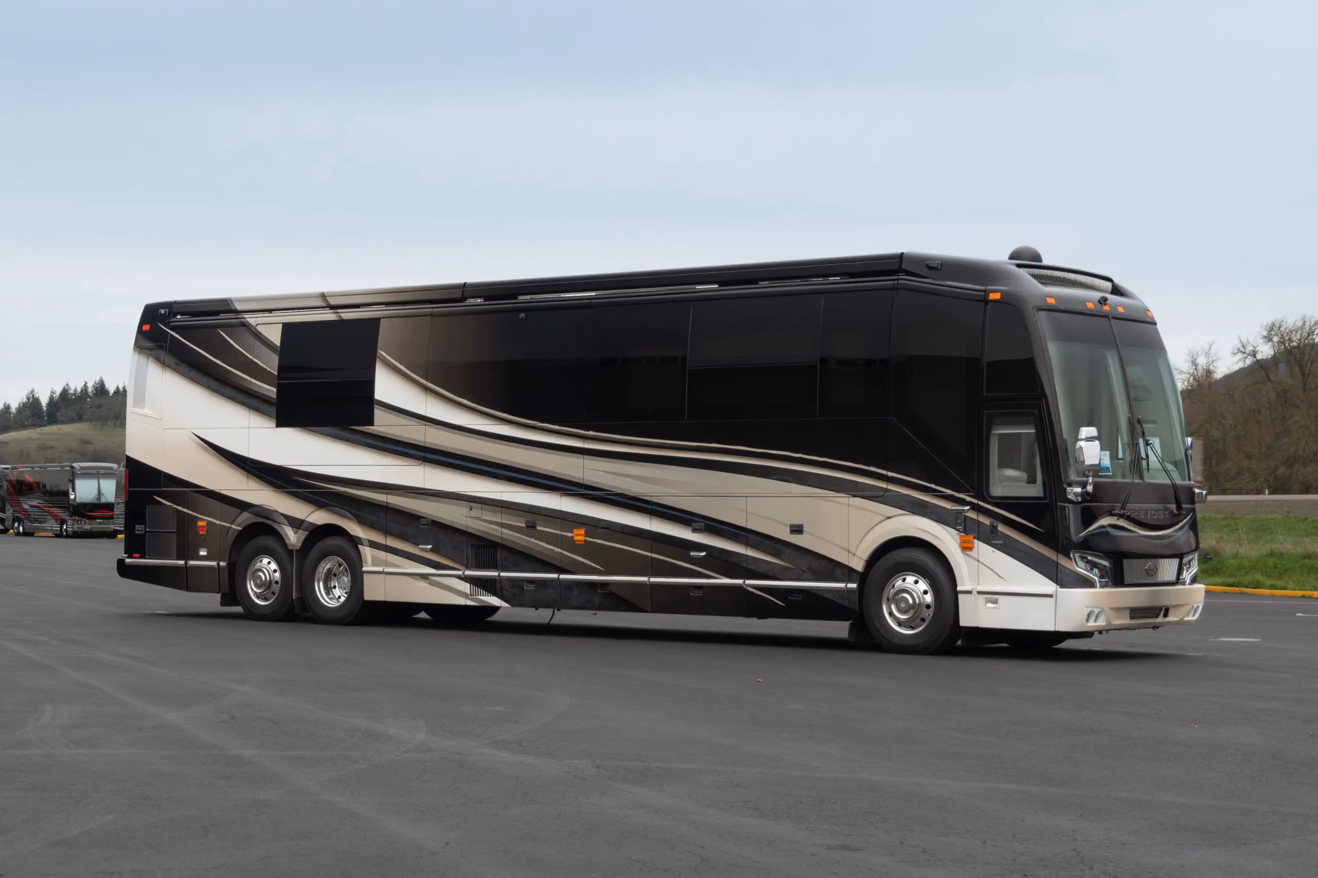Exterior glamour shot of 2022 Marathon Coach 1341 on Prevost H3-45 chassis with quad-slide layout